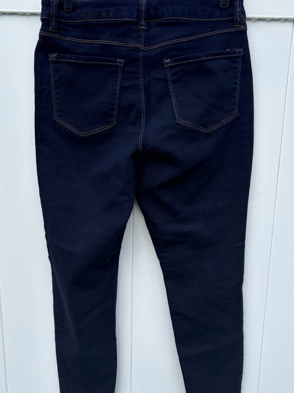 D. Jeans- dark wash skinny jeans - size 10